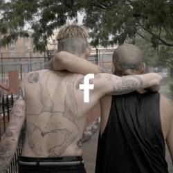 Backs of two people hugging, youtube icon.